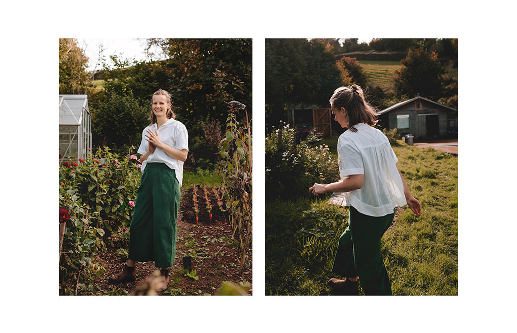 olivia-in-her-allotment-wearing-a-white-shirt-with-green-corduroy-trousers