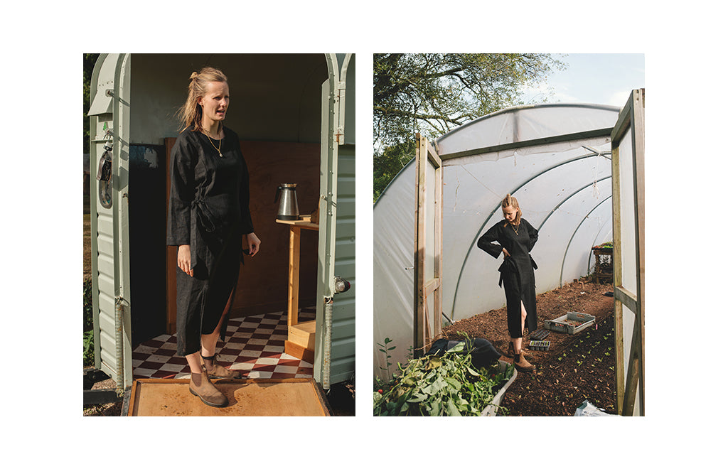 olivia-wearing-a-black-linen-dress-in-her-trailer-and-polytunnel